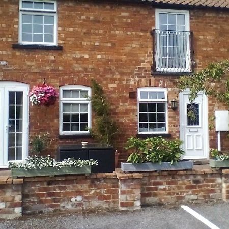 The Lincolnshire Poacher Inn Metheringham Exterior photo